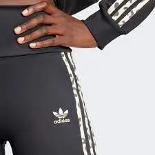 Adidas women's flared pants with leopard print and iconic 3-stripes