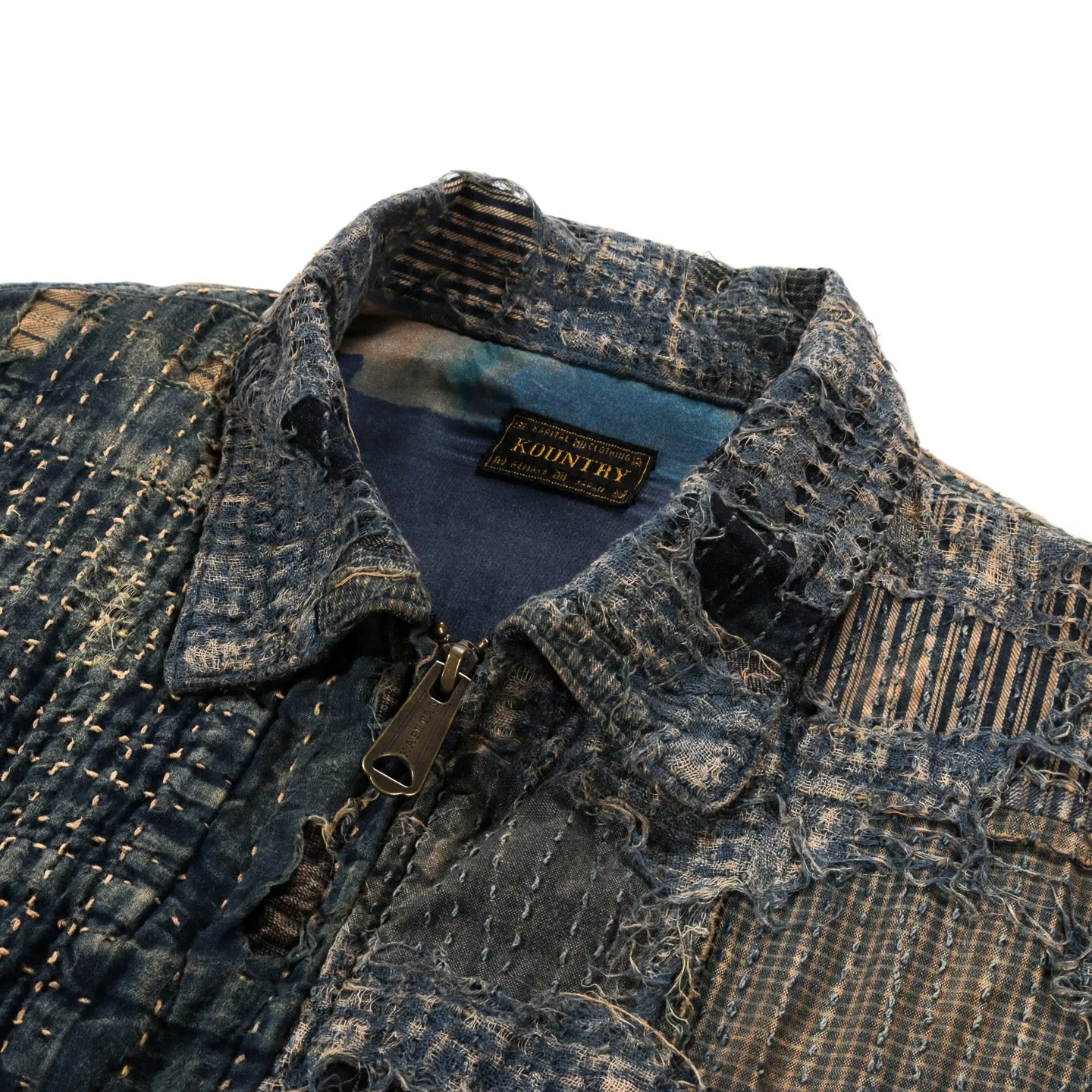 Capitol Borough T-Back Drizzler Jacket in Indigo Blue.