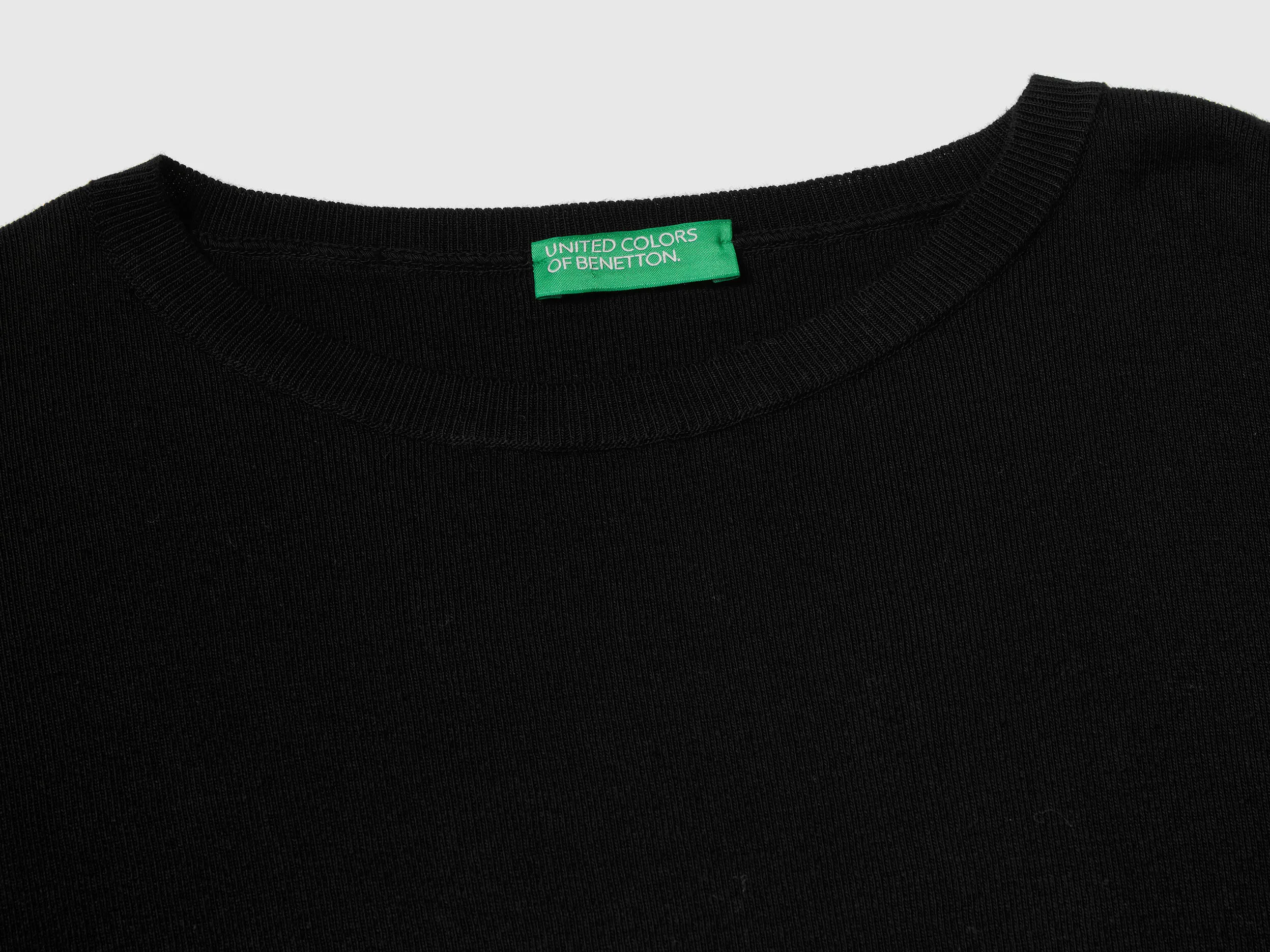 Cotton sweater with round neck - Black | Benetton