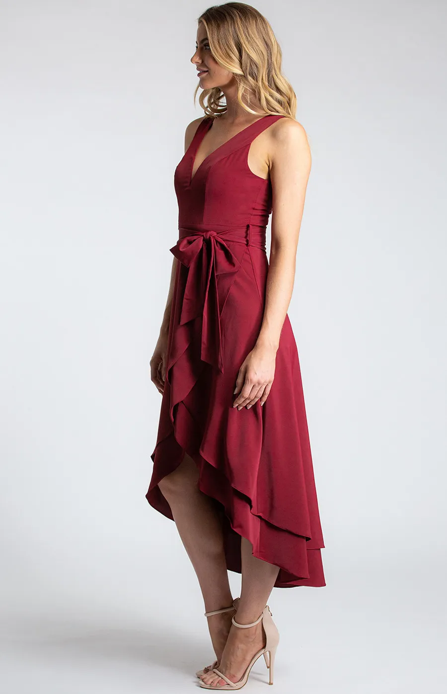 Deep V-Neckline Sleeveless Dress with Waterfall Hem