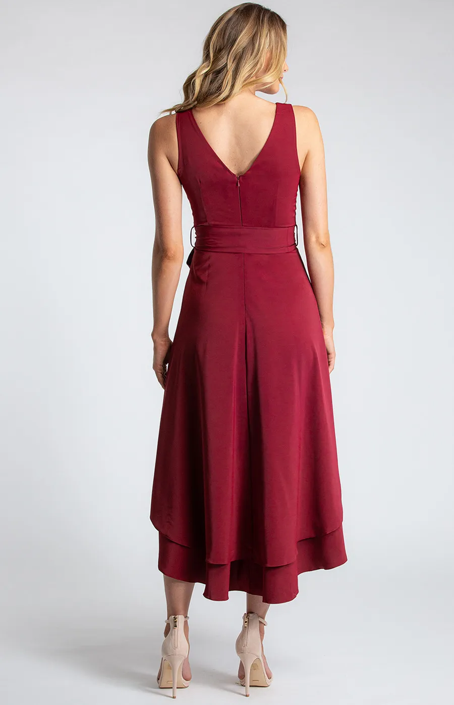 Deep V-Neckline Sleeveless Dress with Waterfall Hem