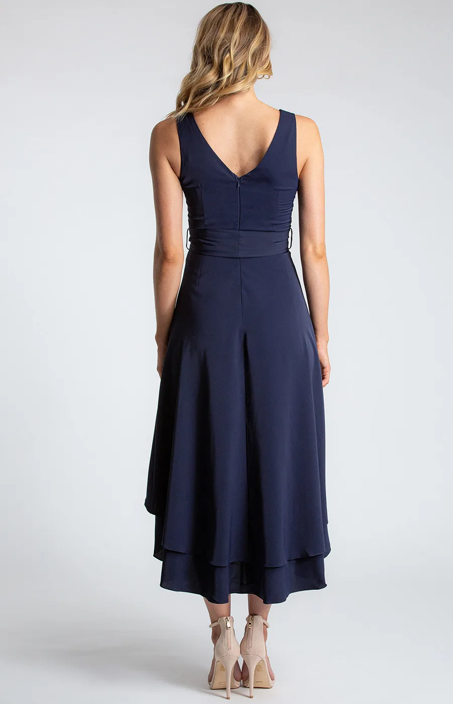 Deep V-Neckline Sleeveless Dress with Waterfall Hem