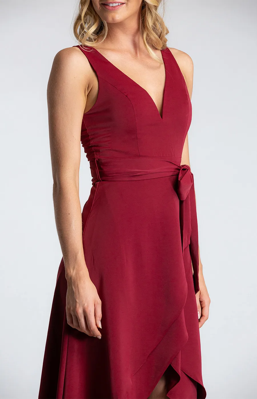 Deep V-Neckline Sleeveless Dress with Waterfall Hem