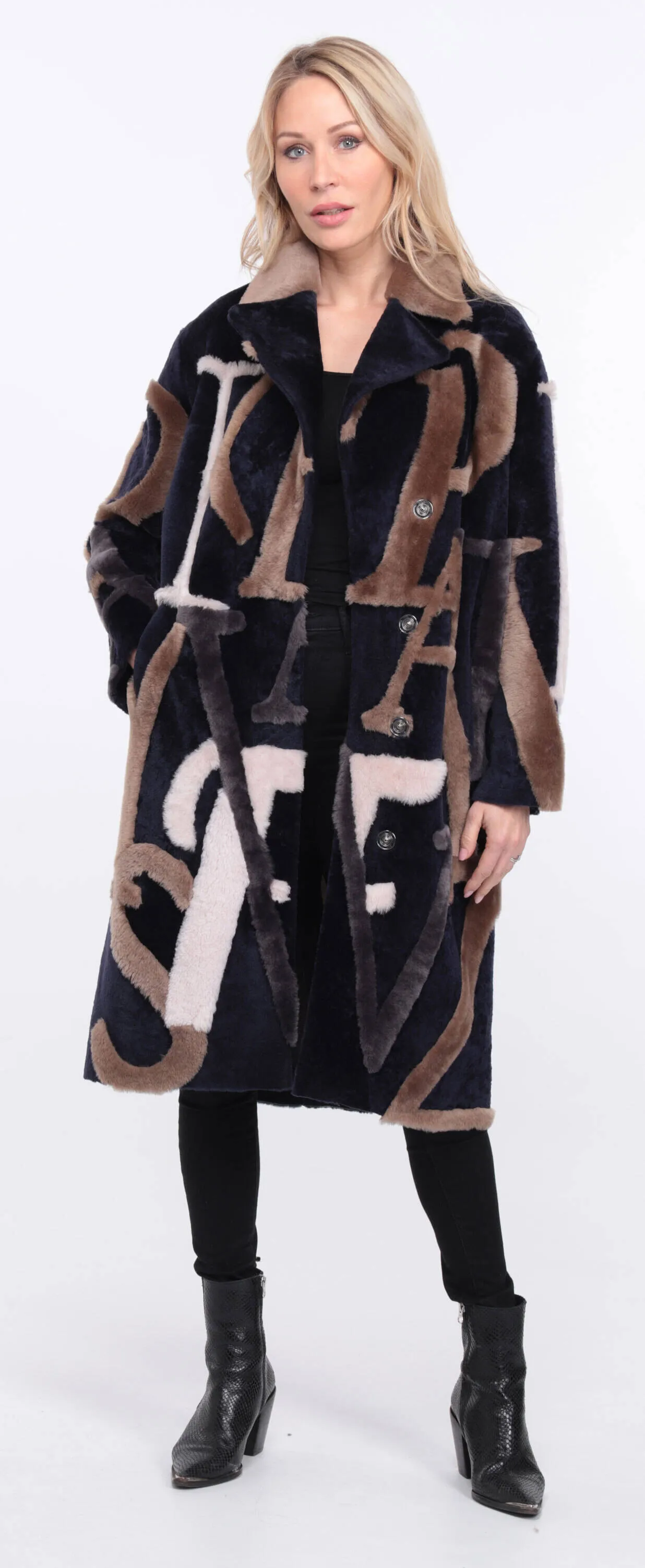 Sheepskin coat with navy/beige starle design for women.